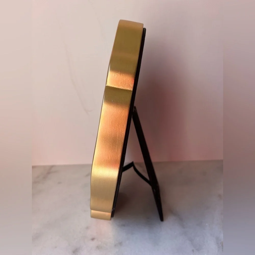 Nicole Miller sophisticated oval